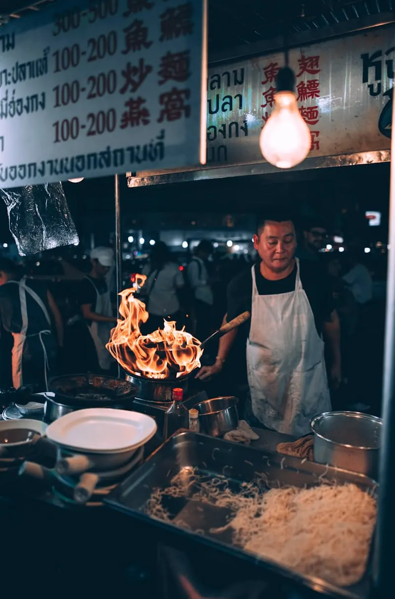 A cook working at a street stall