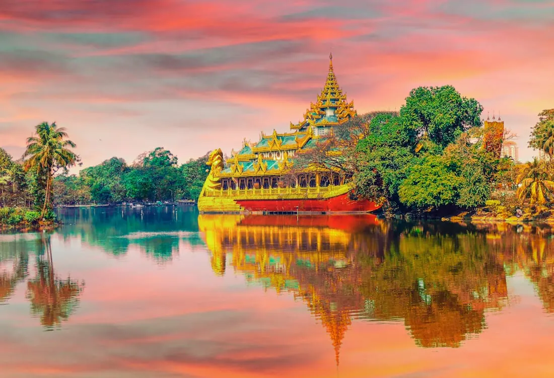A long boat on the river at dawn